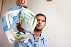 Origami ajuda refugiado sírio a construir nova vida em Zaatari